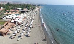 İzmir'in en şirin halk plajı! Akvaryumu aratmayan denizi çocuklu ailelerin vazgeçilmezi oldu