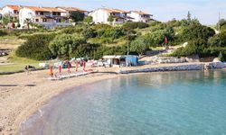 Ulaşımı kolay, denizi eşsiz! İzmir’in en sakin plajlarından biri: Sabah denizi cam gibi oluyor
