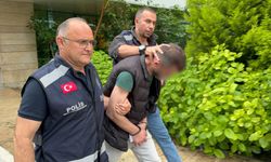 Boşanma sürecindeki çift mezarlıkta tartıştı: Eşini darp eden koca gözaltında