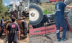 Traktörün altında kaldı, burnu bile kanamadı