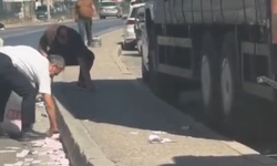 İzmir’de ilginç olay! Paralar saçıldı, trafik tamamen durdu