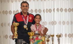 İzmirli itfaiyeci, kızının ilk antrenörü oldu! Kupalar peş peşe geldi