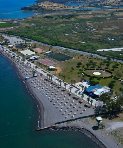 İzmir'deücretsiz Mavi Bayraklı, 5 yıldızlı otel konforunu aratmayan halk plajı! İZBAN'a atlayan soluğu burada alıyor
