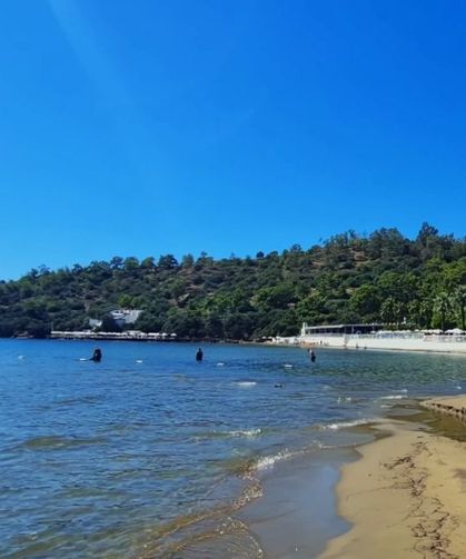 Ne Çeşme ne Urla! İZBAN'la ulaşan denize kavuşuyor: Tertemiz su ipek kumuyla İzmirlilerin hafta sonu rotası burası oldu