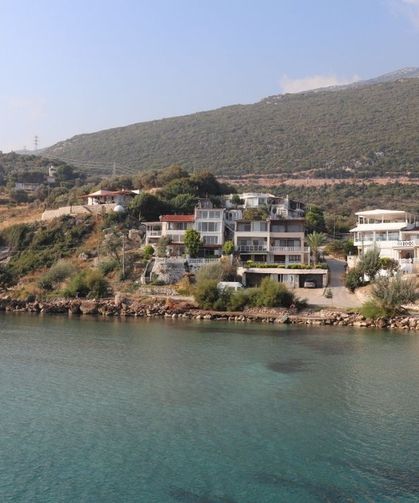Ne Çeşme ne Alaçatı! İzmir'in en sakin balıkçı kasabası: Turkuaz suyu ve berrak deniziyle büyülüyor!