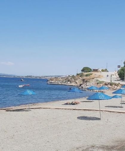 İzmir'de ücretsiz deniz keyfi arayanların yeni rotası: Turkuaz deniziyle büyülüyor! Bu plajı gören hayran kalıyor