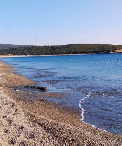 İzmir'de kalabalıktan kaçmak isteyenlerin adresi! Kum denizi, büyük plajı ve buz gibi suyuyla yazın yeni rotası