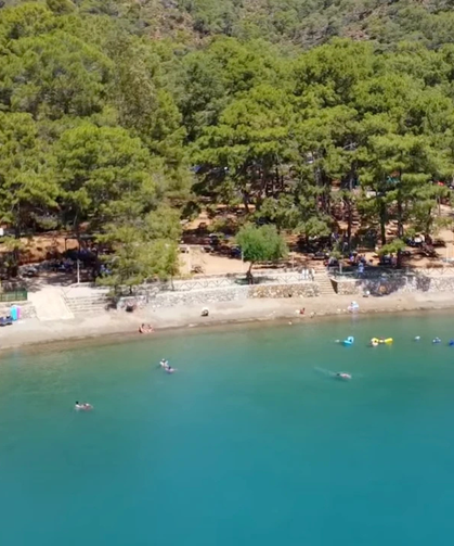 Fethiye’yi solladı geçti! Çarşaf gibi deniziyle aileler ve kamp severlerin buluşma noktası