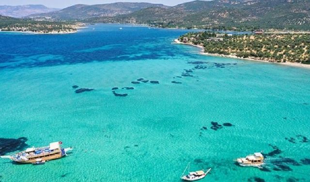 Ne Çeşme ne Bodrum! Beyaz kumları ve cam gibi deniziyle İzmir’e bu kadar yakın ve uygun fiyatlı tatil mümkünmüş