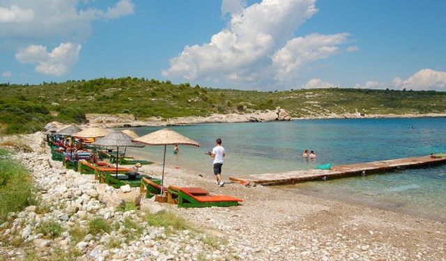 İzmir’den ESHOT’a binen soluğu burada alıyor! Serin deniziyle mes ediyor uygun fiyatlarıyla ziyaretçisini üzmüyor