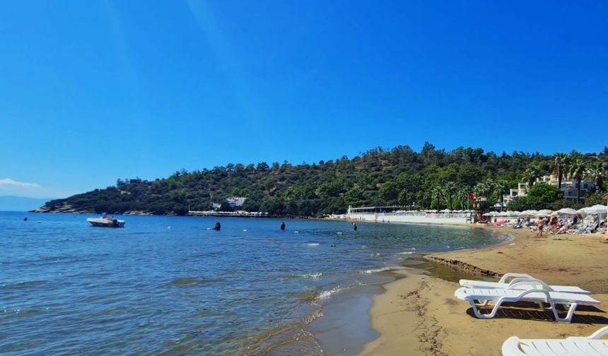 Ne Çeşme ne Urla! İZBAN'la ulaşan denize kavuşuyor: Tertemiz su ipek kumuyla İzmirlilerin hafta sonu rotası burası oldu
