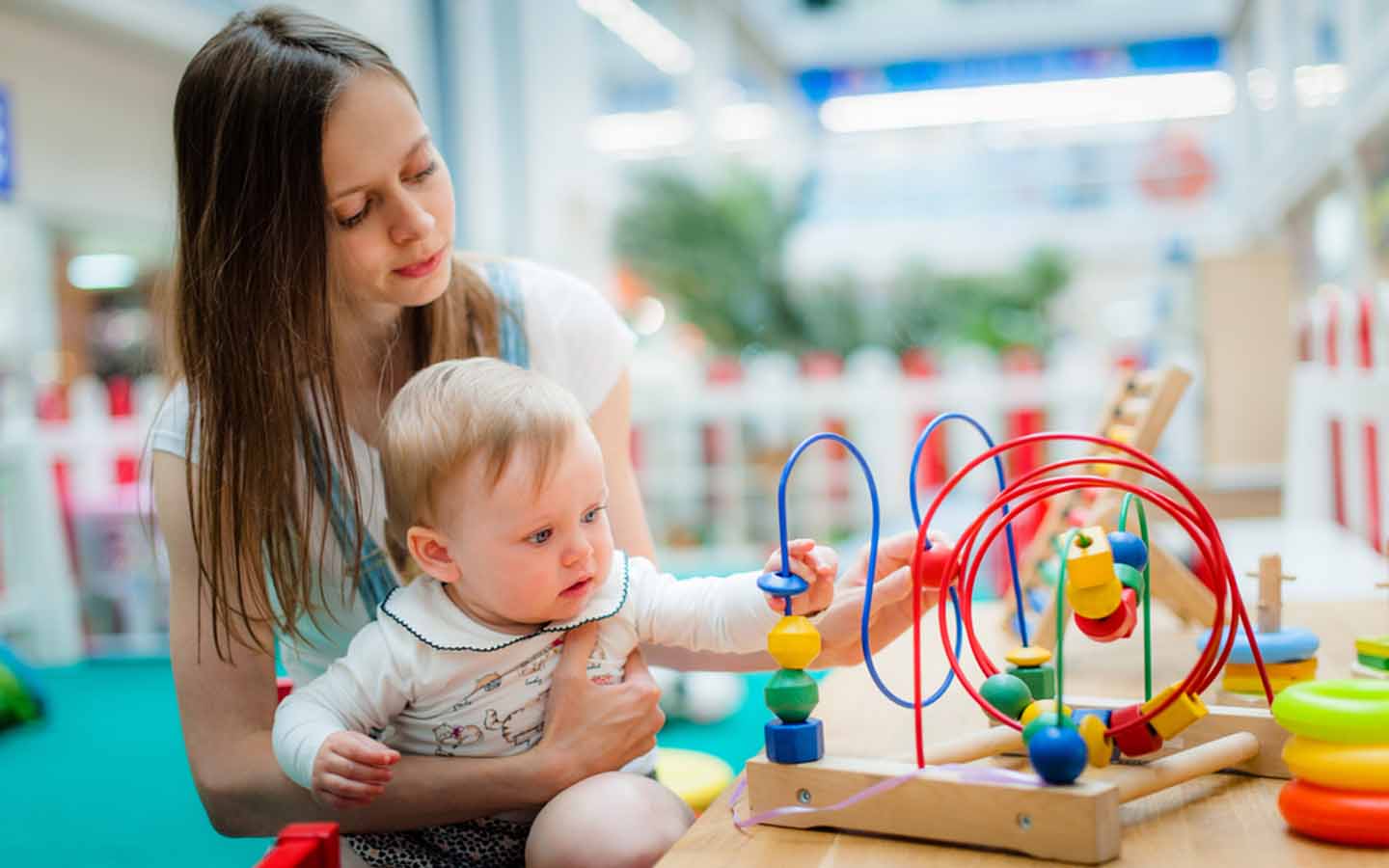 Mom And Baby Playing