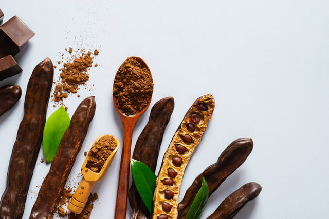 Carob Bean And Powder Flat Lay On Grey Background 2021 09 04 01 32 27 Utc