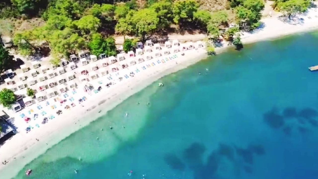 Fethiye'de Hangi Plajlar Mavi Bayraklı Oldu İşte Ücretli Ve Ücretsiz 2026 Tatil Rotalarının Tam Listesi (3)